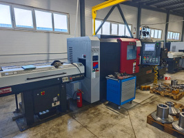 Токарный центр SKM NL 2500M/1100 + барфидер DH32 БУ